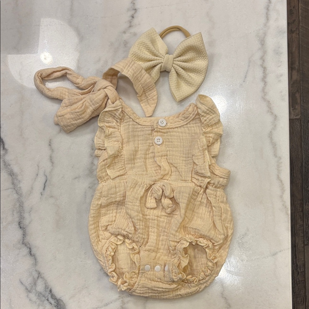 Cream Ruffled Baby Romper with Bow